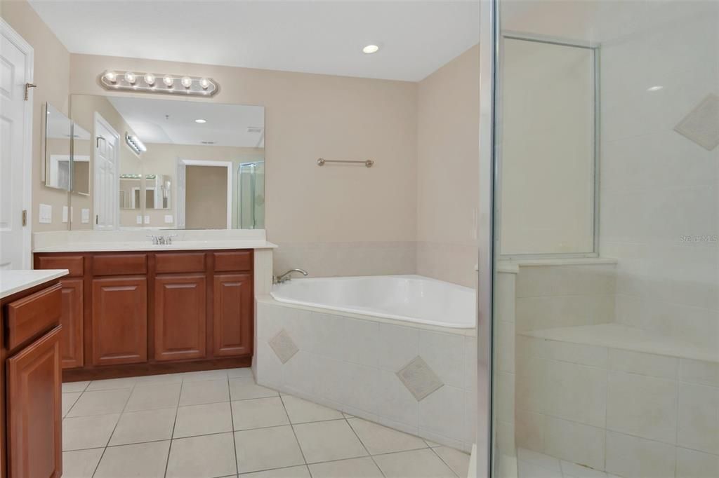 Primary bath - separate his/hers vanities, tub and separate shower.