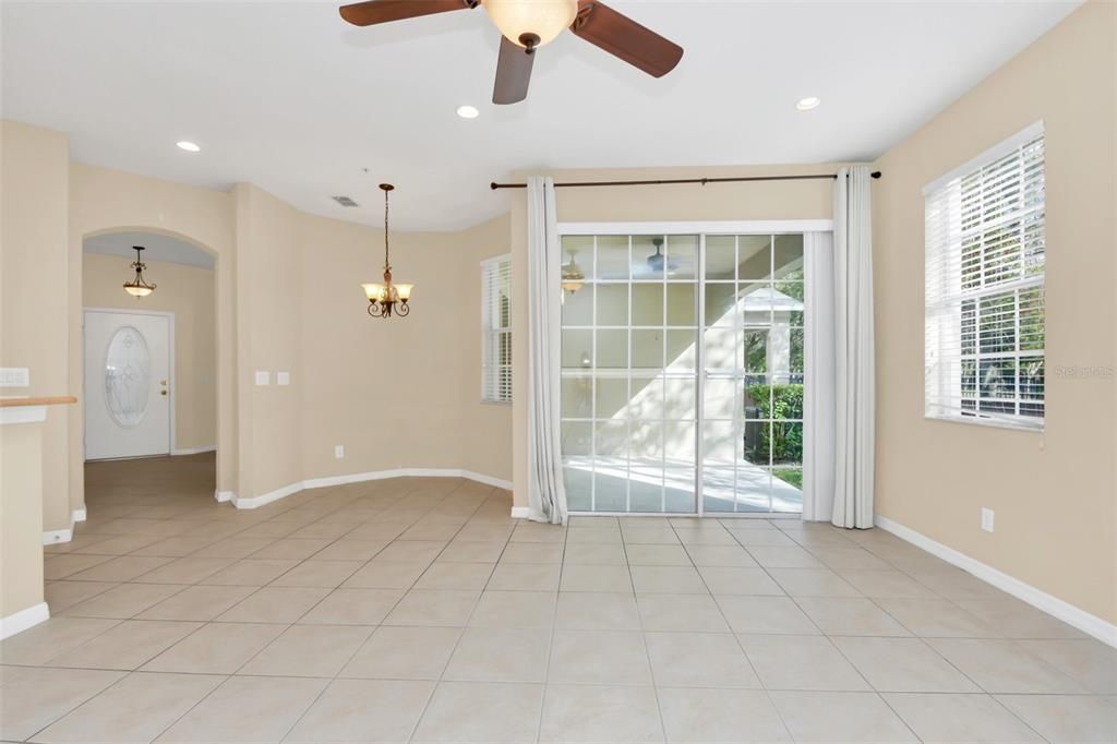 Family room, breakfast area - view to entrance foyer and patio