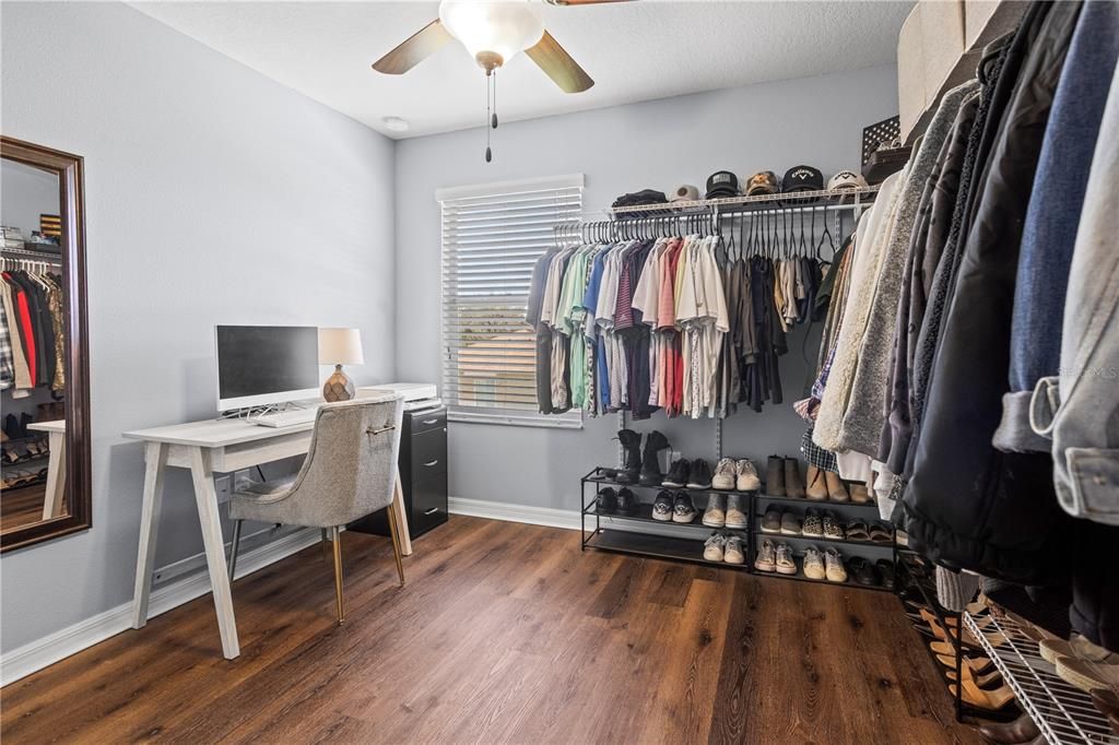 Bedroom 3 ( currently used as a clothes storage)