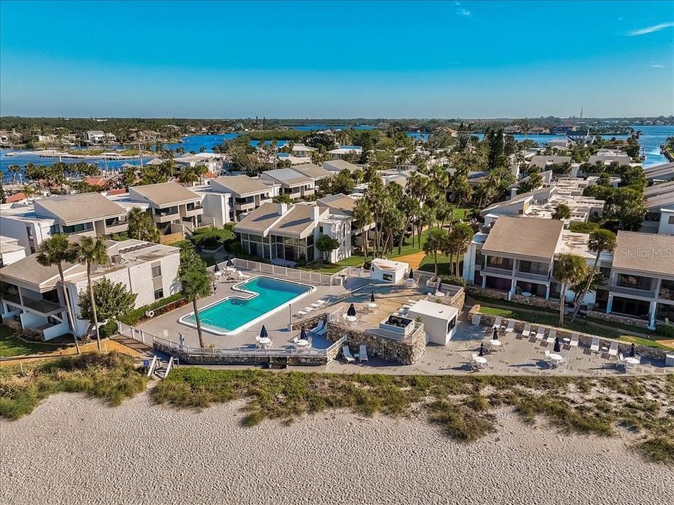 Ariel view of the private beach, community pool and west side of the BVG complex