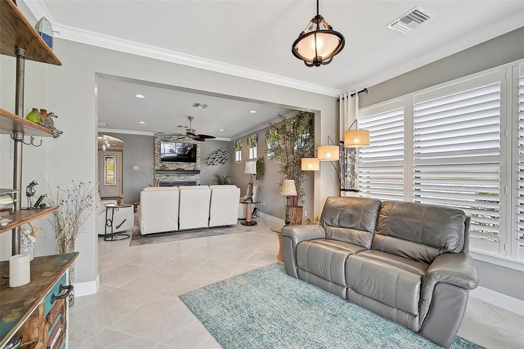 Additional Florida Sunroom off the main living area before going out to the pool area