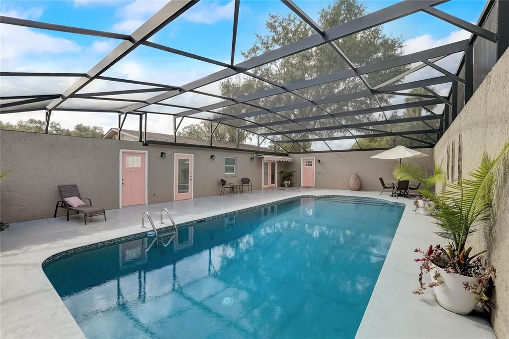 Screened enclosed pool located off Bridal House on back of property