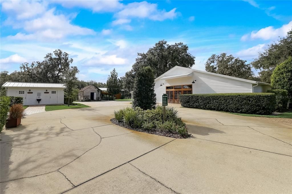 View from left to right of bathrooms, she shed and event venue