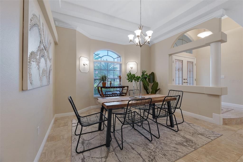 Just inside the front entrance and next to the kitchen is the dining area with plenty of room for entertaining.