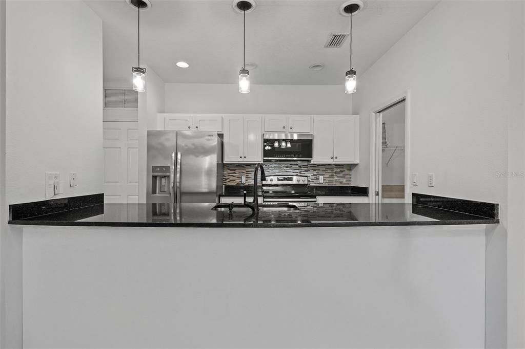 Kitchen with granite countertops