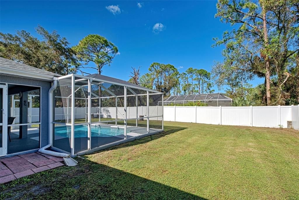 There is a large backyard that is fenced providing plenty of privacy.