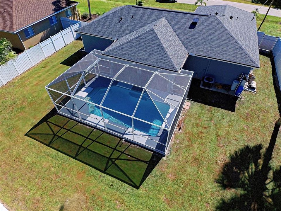 An aerial view of the pool and lot of this beautiful home.