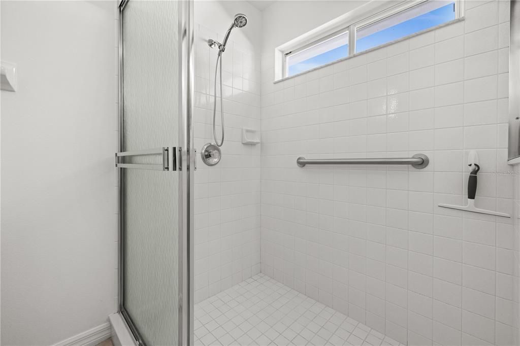 PRIMARY BATHROOM HAS LARGE WALK-IN SHOWER.