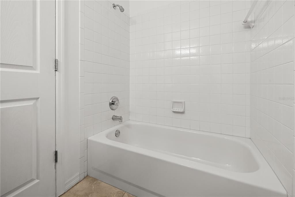 MAIN BATHROOM TUB AND SHOWER