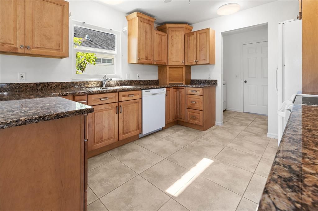 THE UPDATED KITCHEN HAS TONS OF NATURAL LIGHT