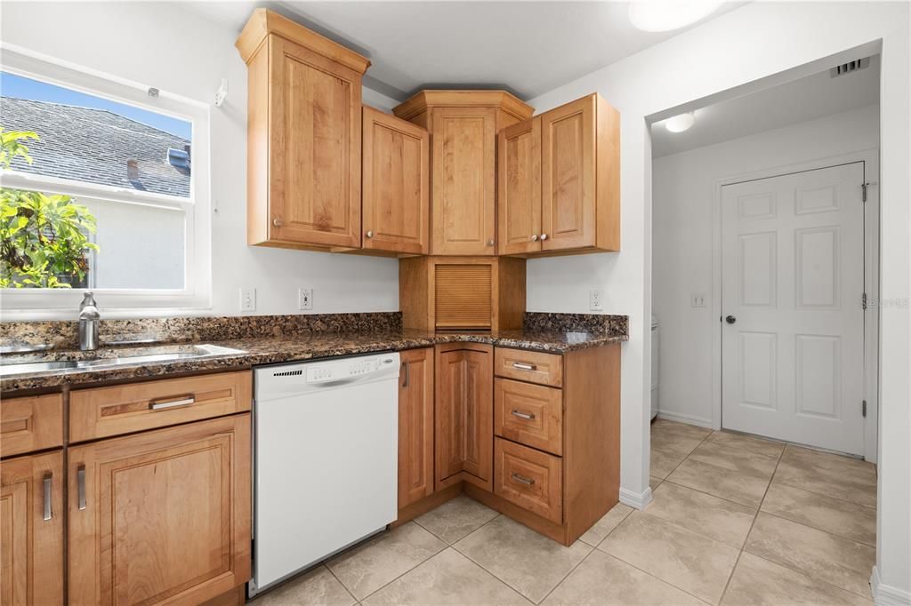 THERE IS PLENTY OF STORAGE AND A LARGE PANTRY LOCATED IN THE LAUNDRY ROOM