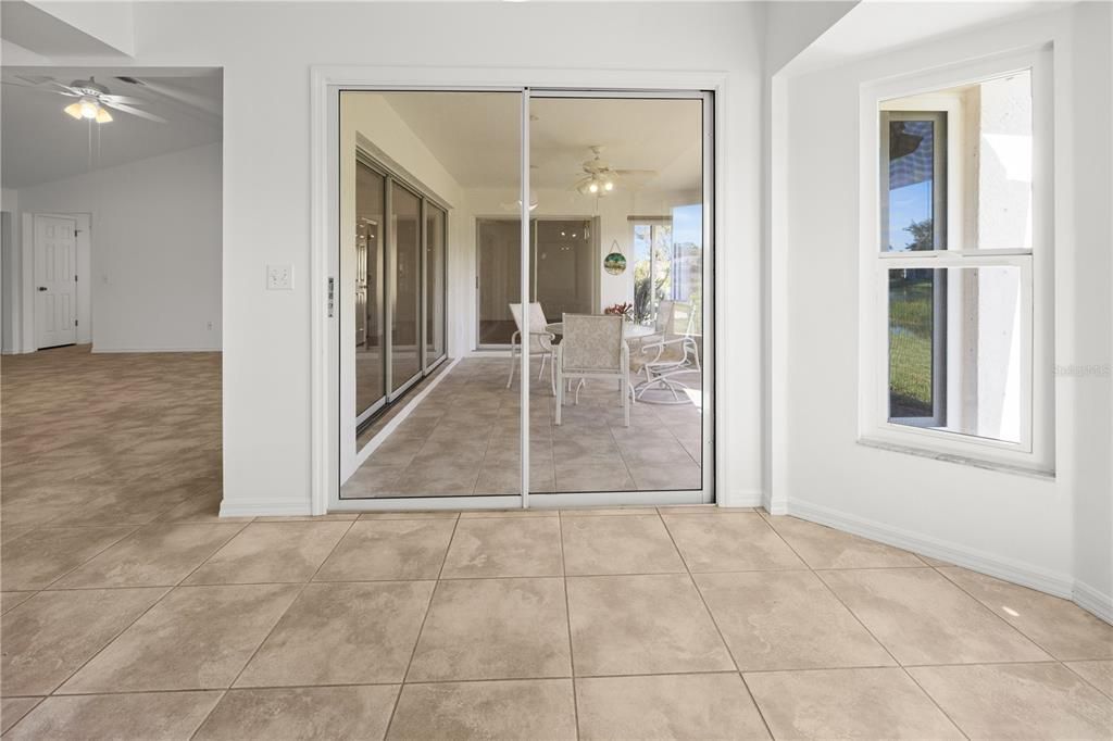 THERE IS EASY ACCESS TO ENCLOSED LANAI FROM THE DINING ROOM.