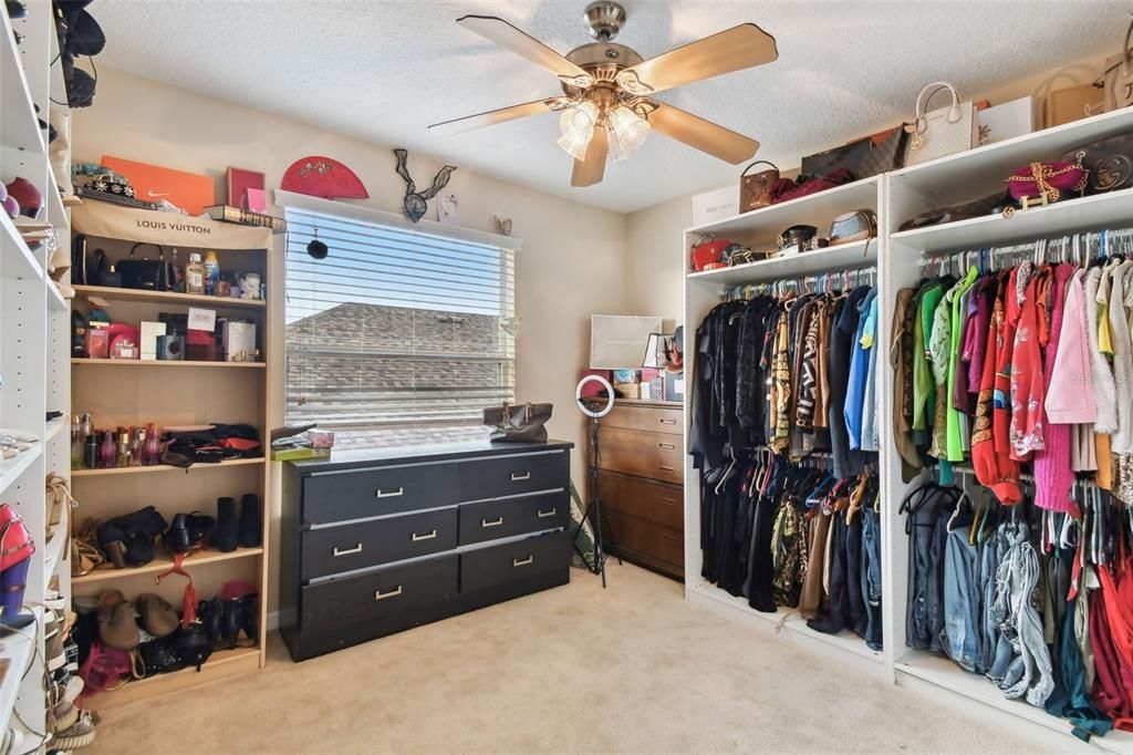 Bedroom #2 , 2nd floor . used as walk in closet built in shelving is removable or may convey