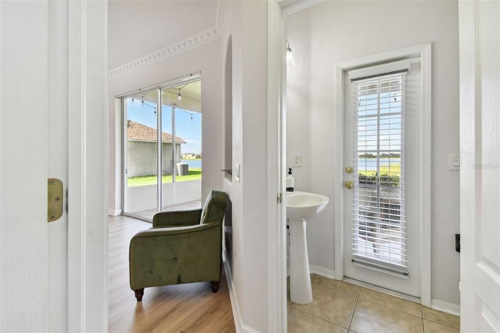 1/2 bath powder room off back patio and family room