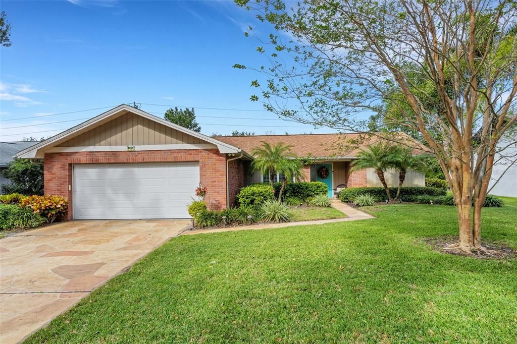 Welcome home! Beautifully updated with modern stamped stone pattern driveway & walkway~