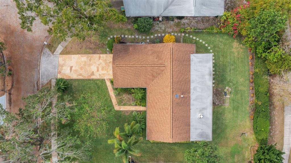 Overhead view shows off the attractive landscaping along with the drive and sidewalk~