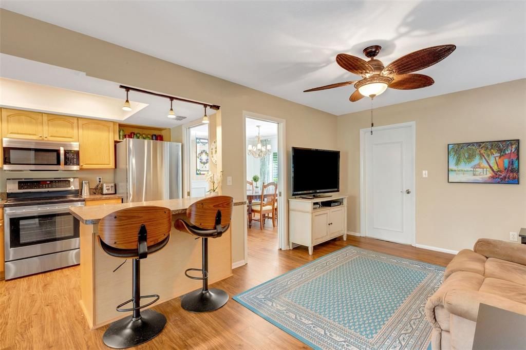 A breakfast bar for extra seating & garage access~