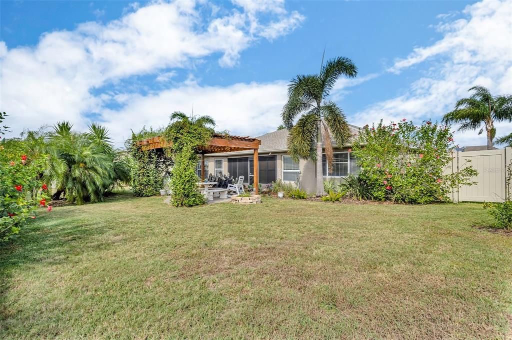 Beautiful and well -kept private fenced in backyard