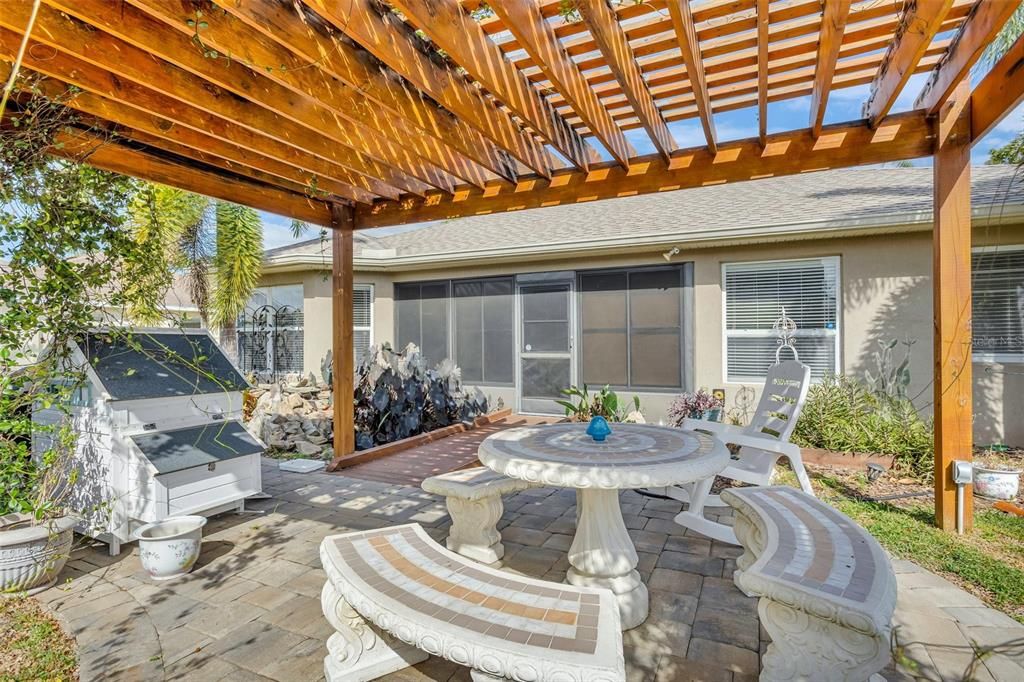 Outdoor living area with Koi pond and cozy Gazebo