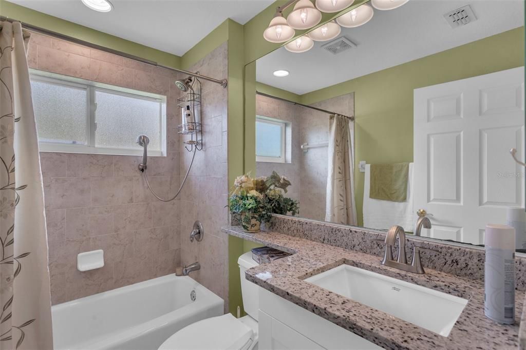 Bathroom #2 with Single vanity and shower tub combo