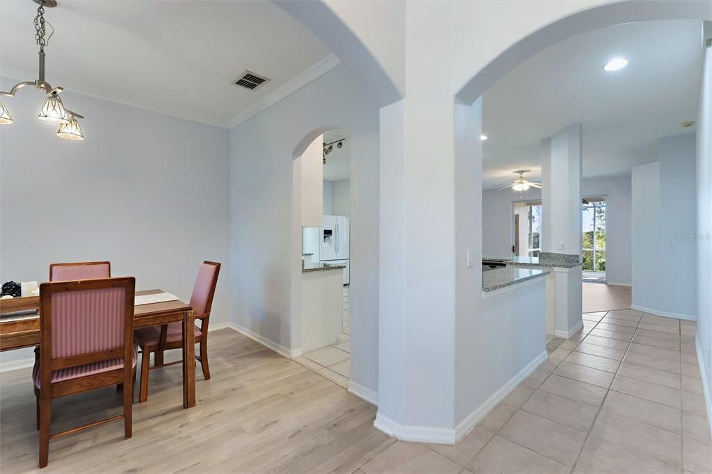 Dining Room w/view of kitchen entry and long Hallway