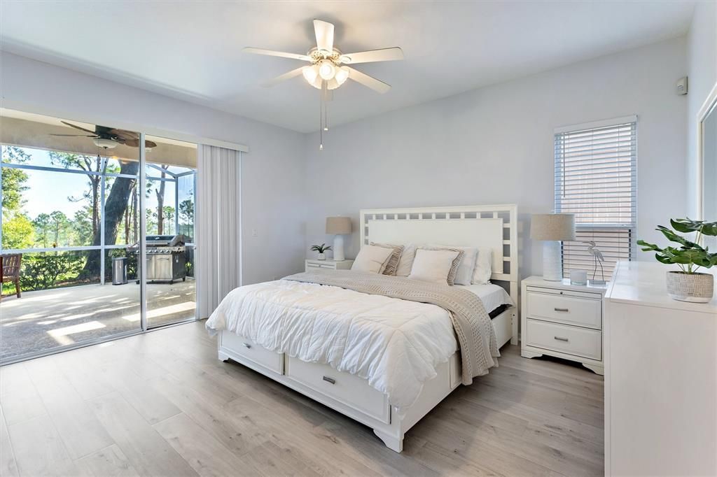 Primary Bedroom with view of Patio