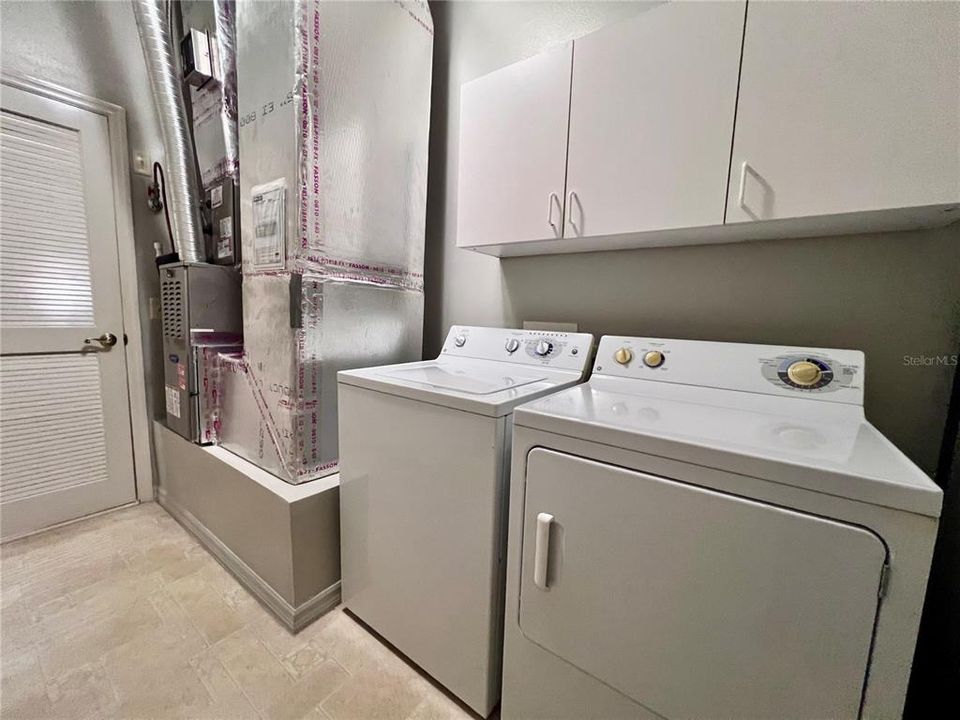 Laundry/ utility room toward door to house