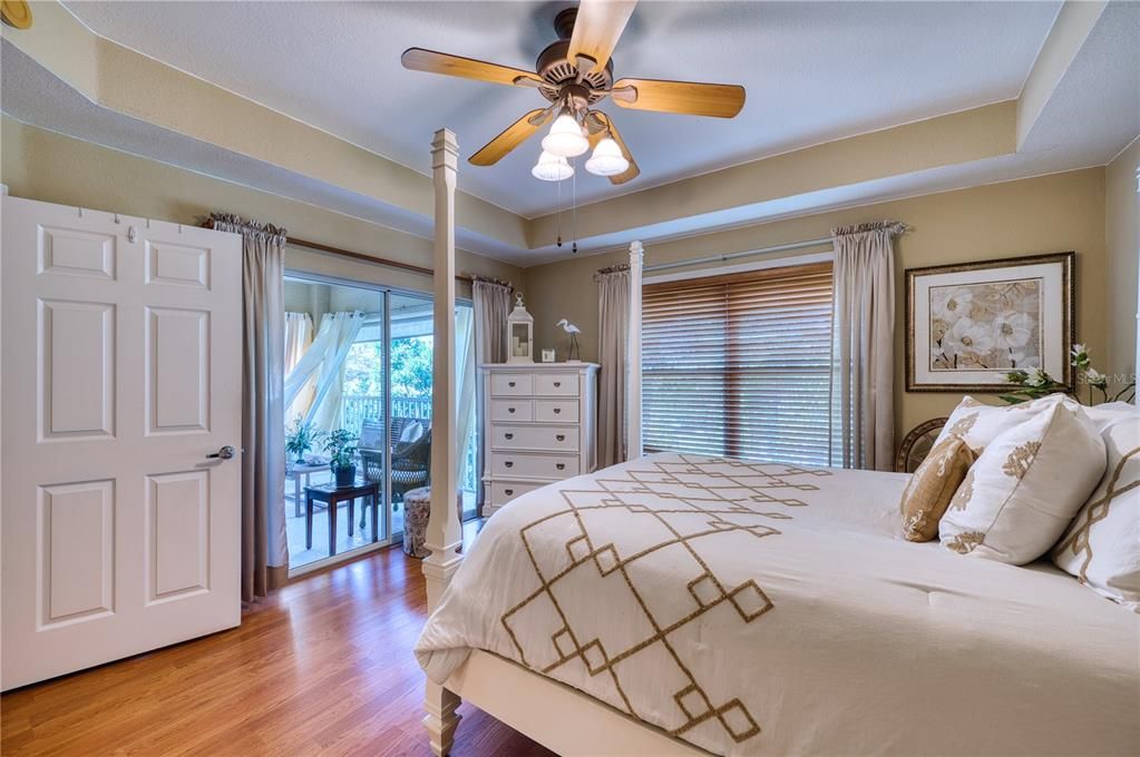 Primary Bedroom with Slider Doors to Patio