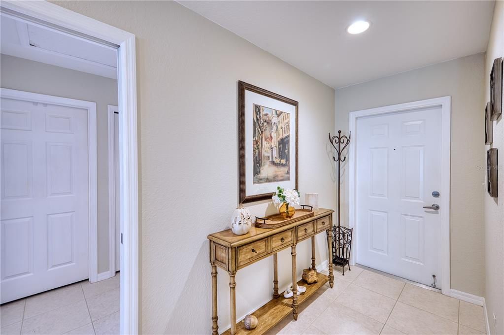 Entry inside the Front Door with entrance into the front bedroom/bath