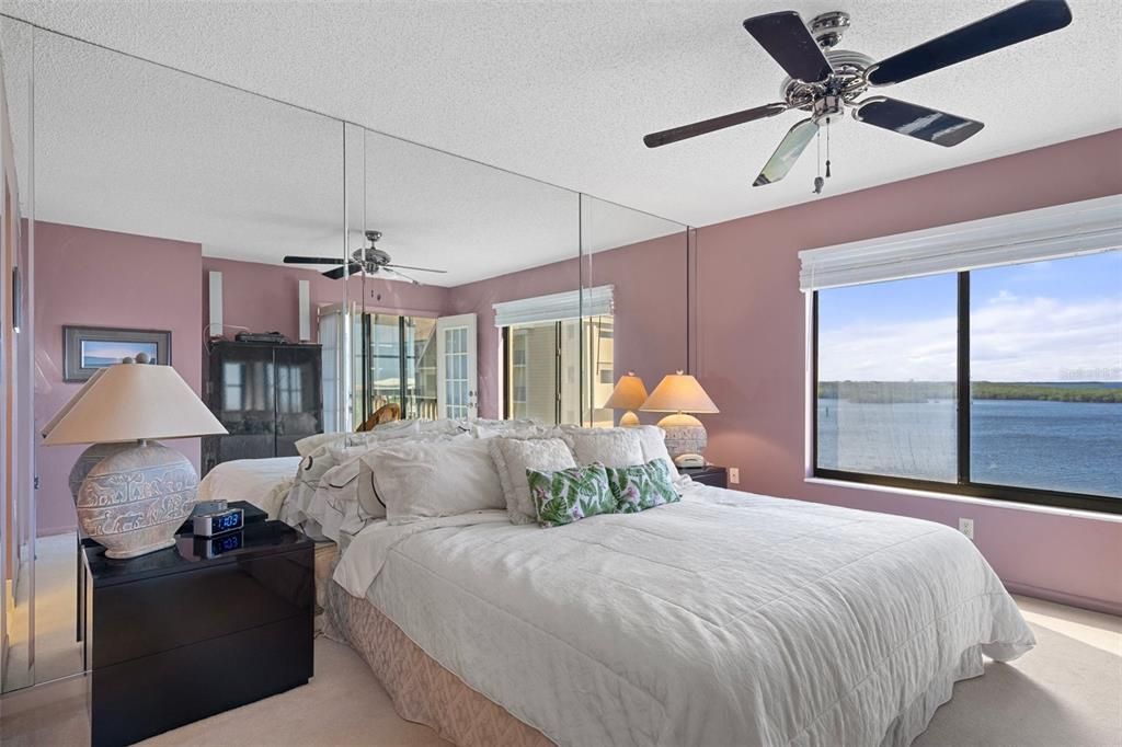 Master suite with waterfront view