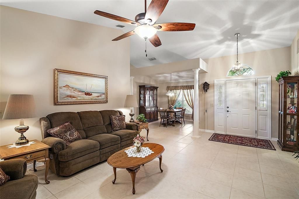 Living room towards foyer and dining.