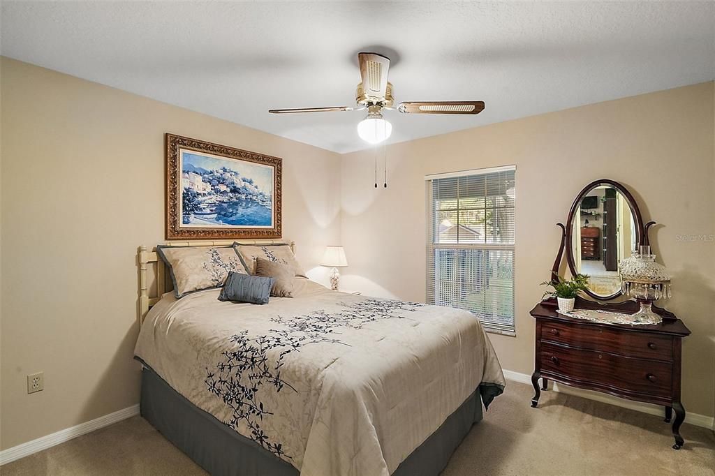 Bedroom 3, with views of the backyard