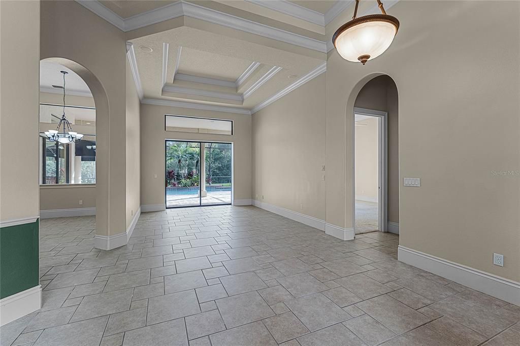 Living room offset from formal dining room