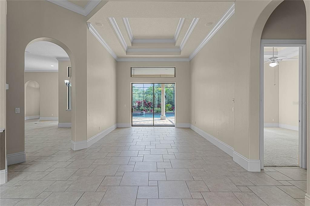 Living room with access to the pool