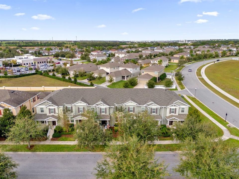 Aerial view of the property and community (front)