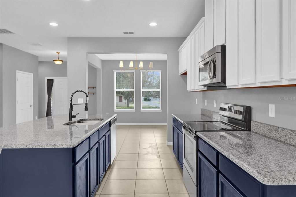 Kitchen- with granite counters and stainless steel appliances