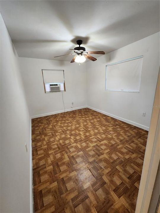 One of the two bedrooms off of the large Family room