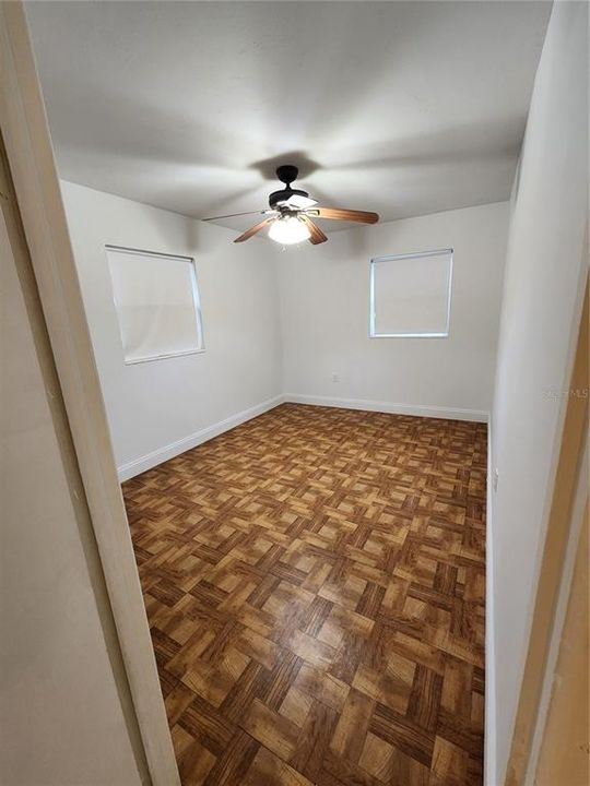 One of the two bedrooms off of the large Family room