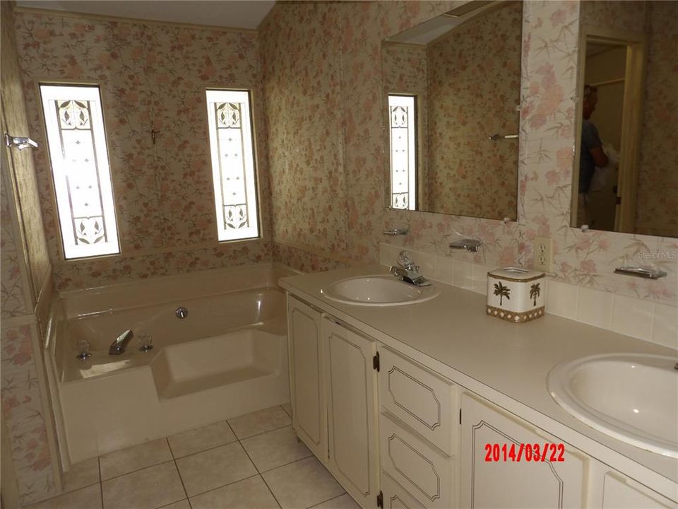 Primary bathroom with a soaking tub and also their is a shower