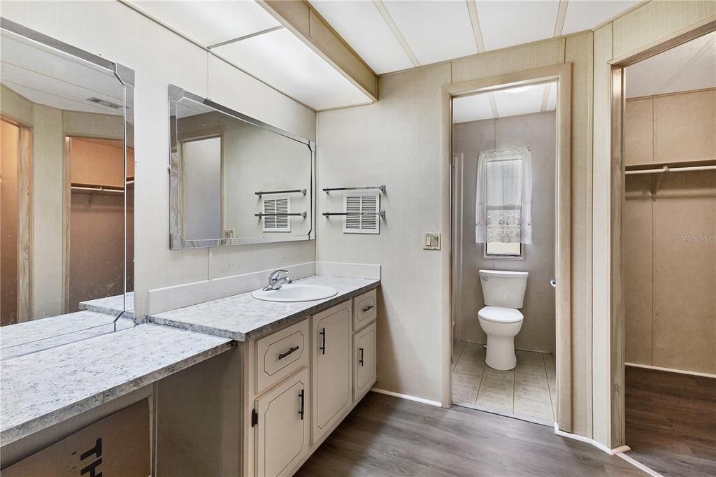 Owners ensuite bathroom featuring a walk-in shower