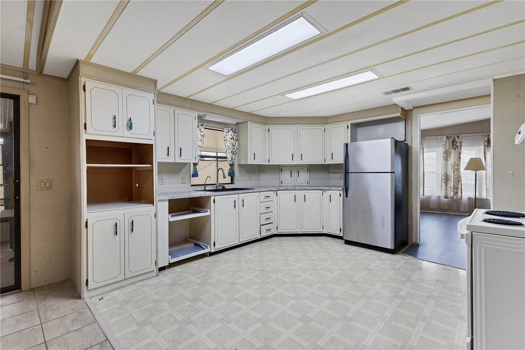 Ample cabinetry and storage makes this kitchen super functional.