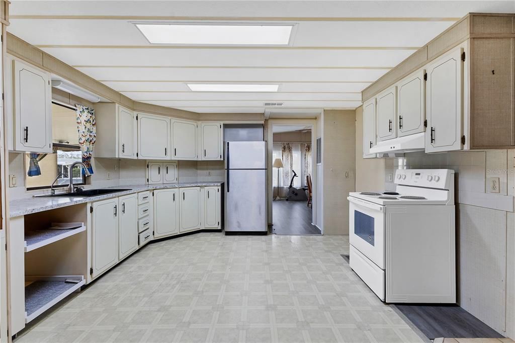 The kitchen provides a spacious layout perfect for multiple people cooking at the same time.