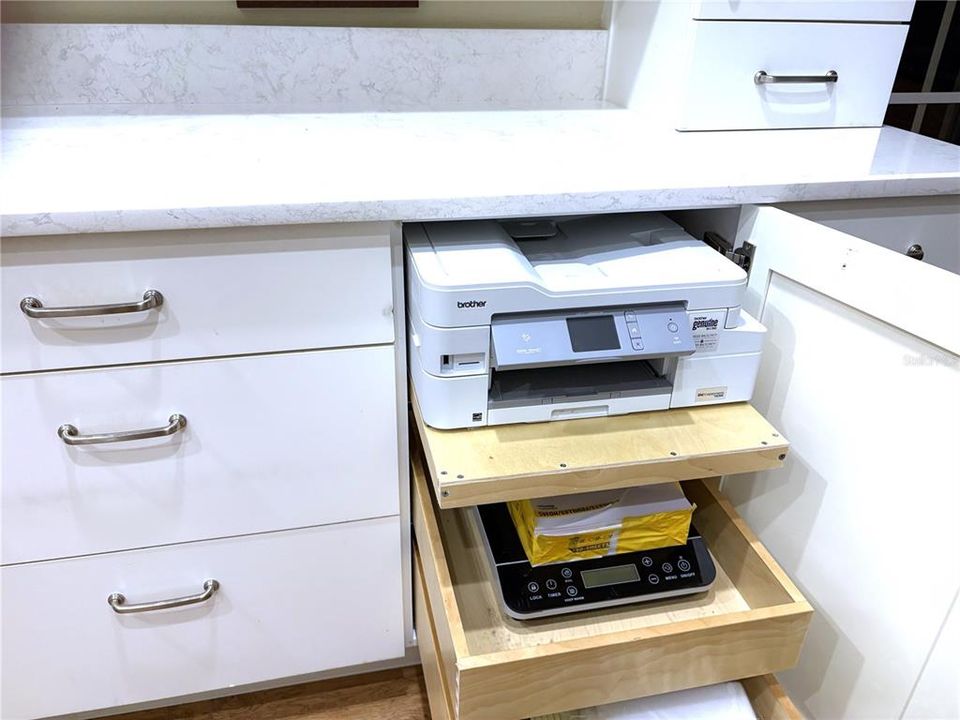 CUSTOM STORAGE DRAWERS AND SHELVING FOR YOUR HOME PRINTER, ALL CONVENIENTLY TUCKED IN THE CABINETRY- PERFECT