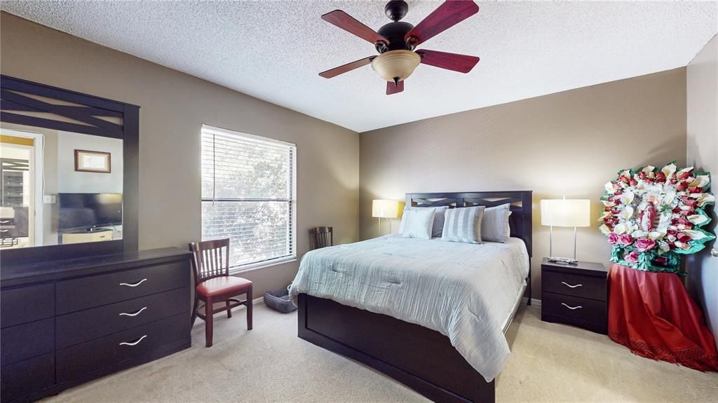 Upon entering the master bedroom, you'll find a spacious and peaceful retreat with ample natural light, large windows, and plenty of closet space, offering a calm and inviting atmosphere for rest.