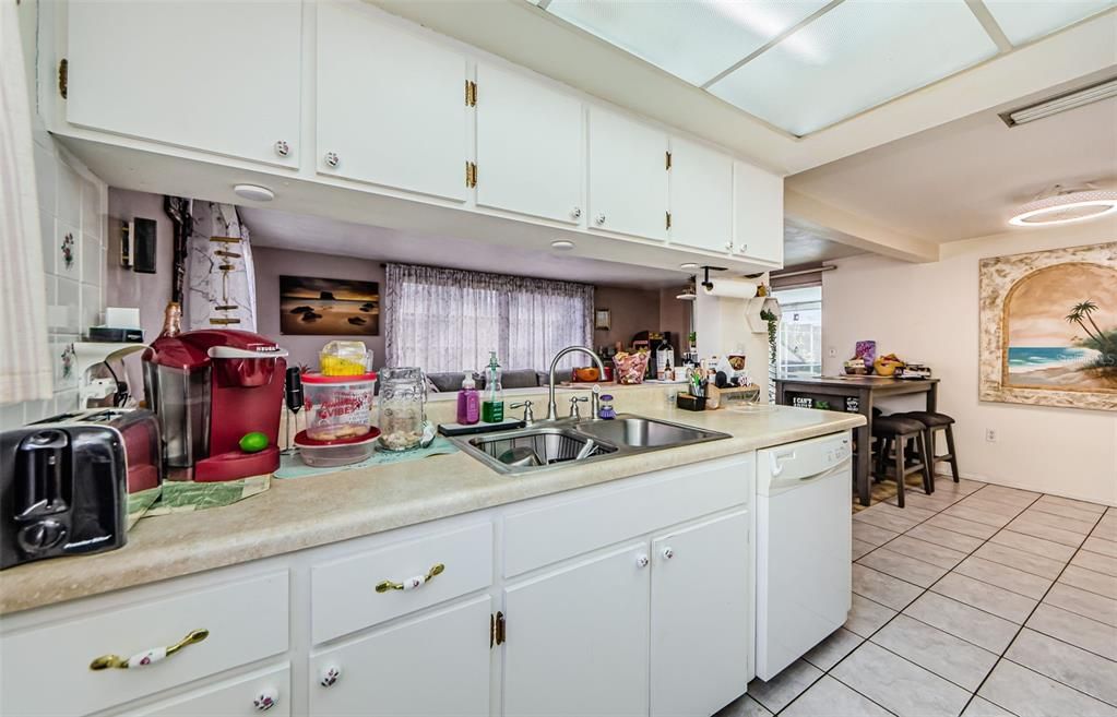 Kitchen with pass thru to the family room