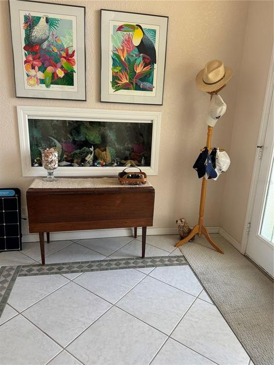 built in aquarium in foyer