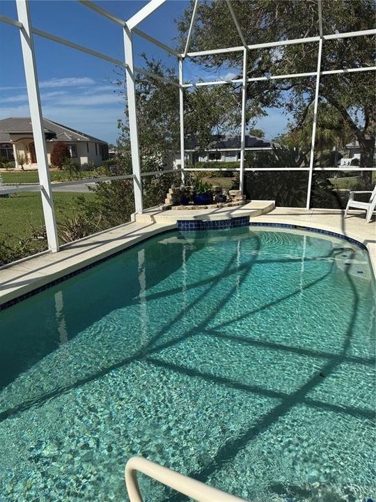 solar heated pool with waterfall