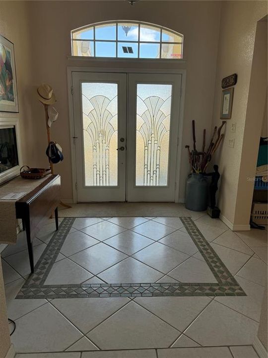 foyer with pretty double door entry