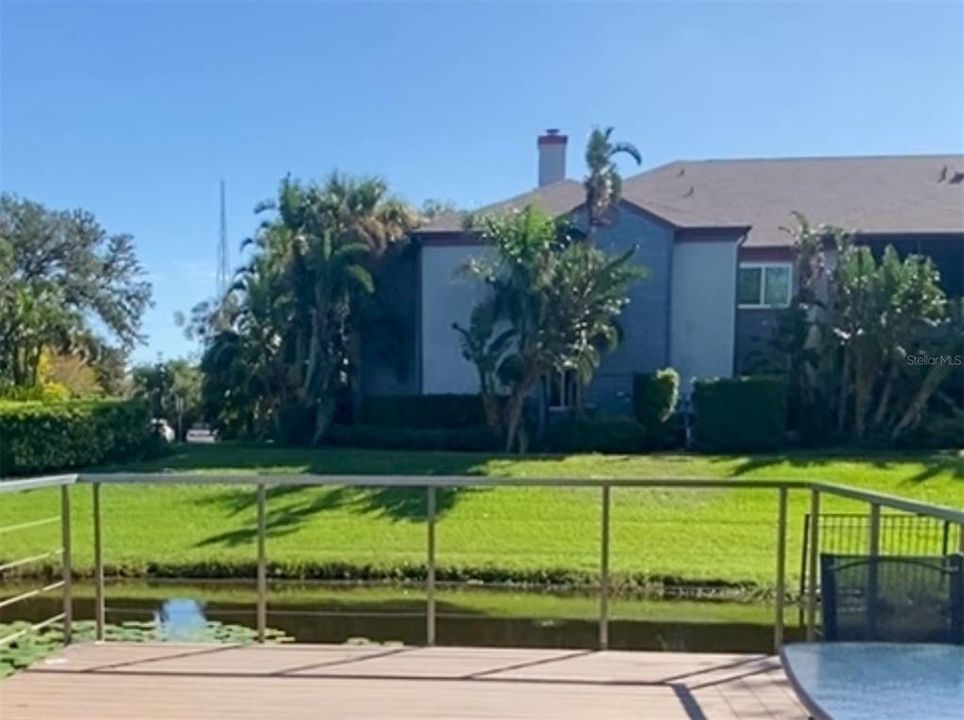 Corner condo located on the first floor with view of pond.