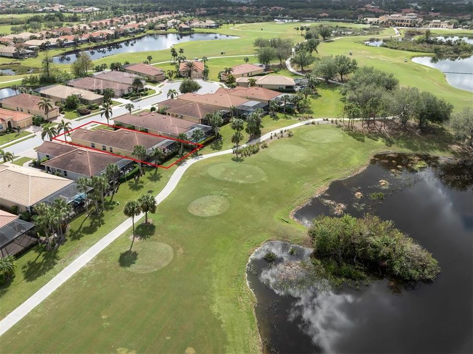 Golf course and lake beyond the lanai